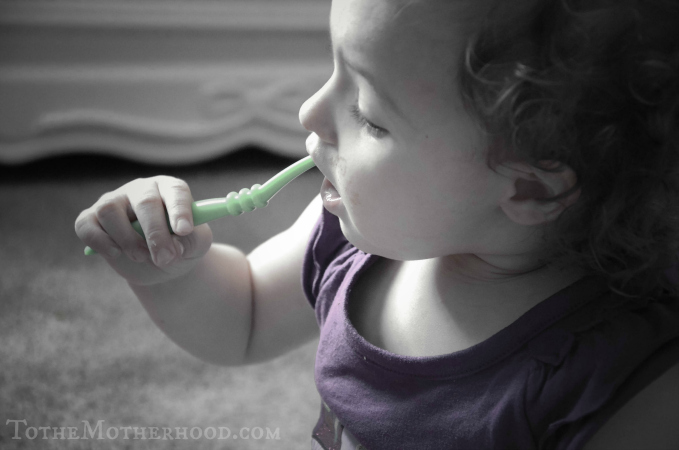 Daughter Brushing Her Teeth